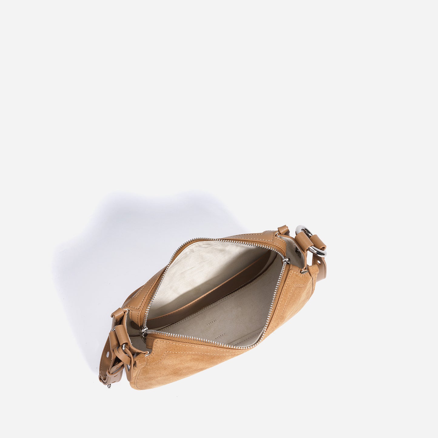 Sac à main élégant en forme arrondie avec bandoulière ajustable